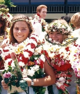 Cindy and Tiffany at seventeen, in graduation leis